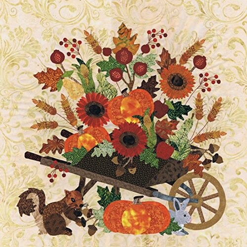 Wheelbarrow with autumn leaves, sunflowers, pumpkins, squirrel, and rabbit.