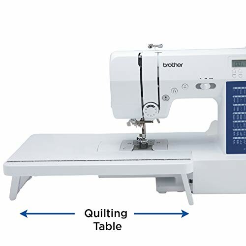 Brother sewing machine with quilting table attachment.