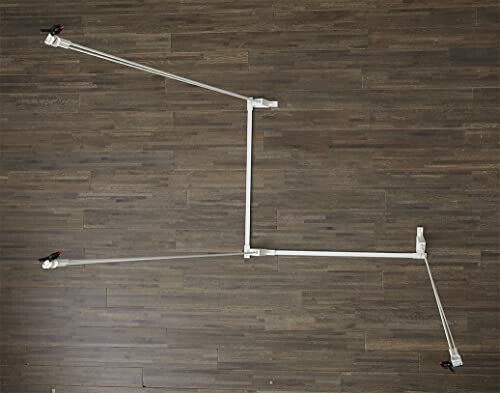 Ceiling mount bike rack on wooden floor