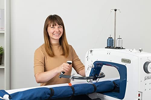 Woman using a quilting machine